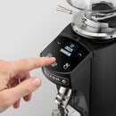 Close-up of Mazzer Mini digital control panel displaying shot count and grind settings