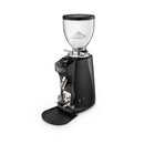 Mazzer Mini On-Demand espresso grinder with LCD screen, chrome portafilter holder, and LED power button