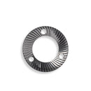 Macro view of dark metal grinding burr plate with radial teeth geometry