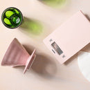 Pink Hario V60 dripper paired with digital scale and water cup