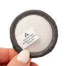 Close-up of Artpresso pad showing stitched edge, foam core, and wash instructions