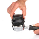Close-up of Artpresso abrasive base cleaning espresso machine basket