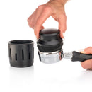 Artpresso espresso basket cleaner tool in use on chrome portafilter