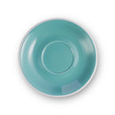 Top-down view of teal glazed porcelain cappuccino saucer with white rim