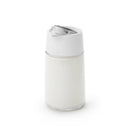 Open OXO creamer dispenser showing internal spout mechanism