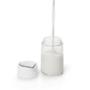 Filling empty OXO glass creamer jar with milk