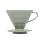 Side profile of Hario V60 Ceramic Coffee Dripper 02 Oil Green with handle