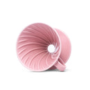 Angled side view of pink Hario V60 dripper showing interior ridges